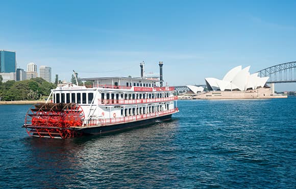 Dine, wine and view the spectacular harbour icons and city skyline from the decks of the Showboat